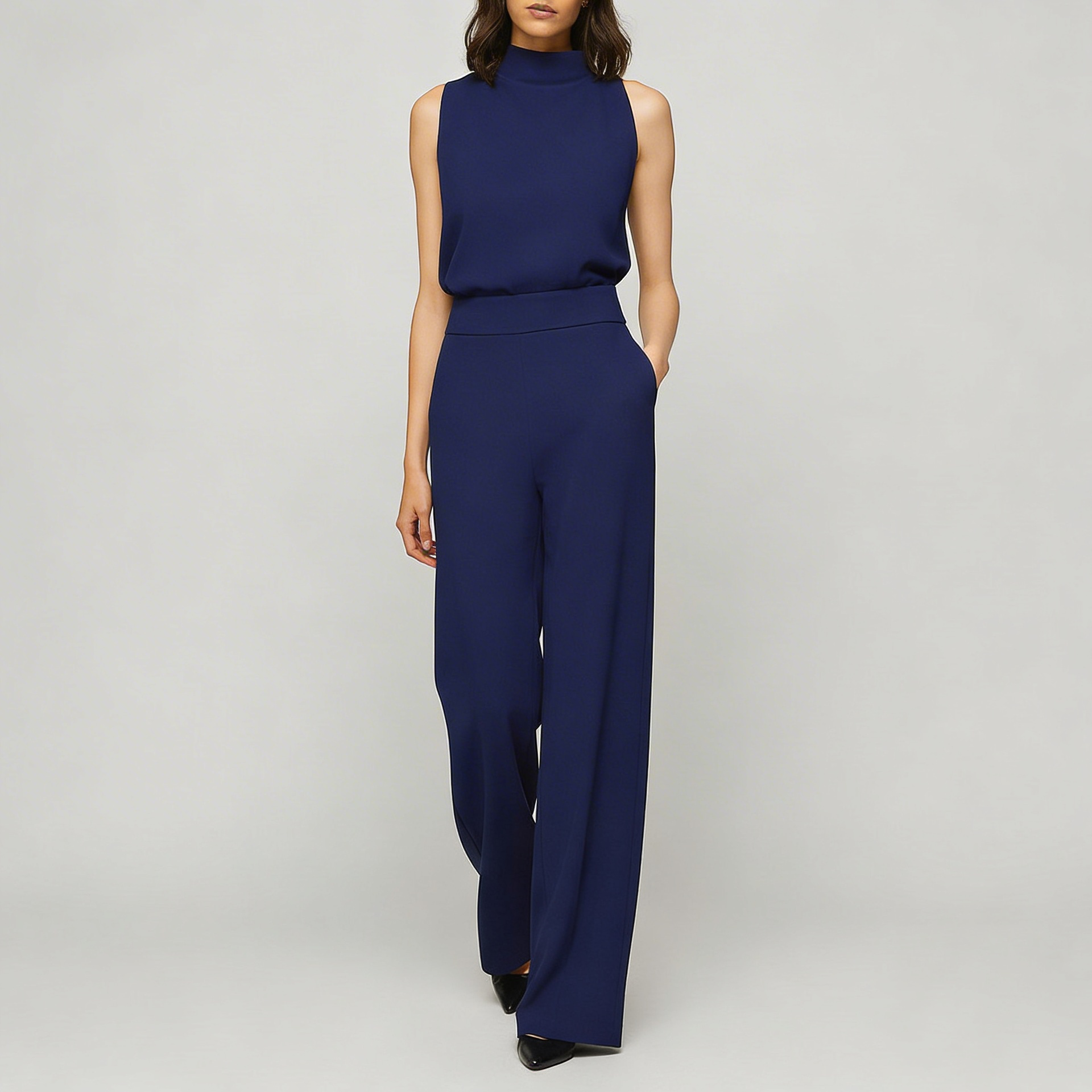 Platomer | Hög midja jumpsuit med vida ben och ärmlös stil